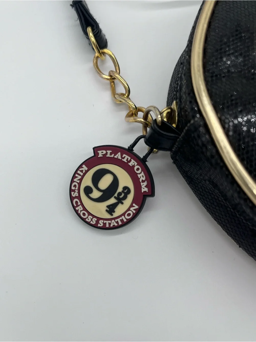 Hogwarts Express Round Crossbody Bag in Black with Gold Trim